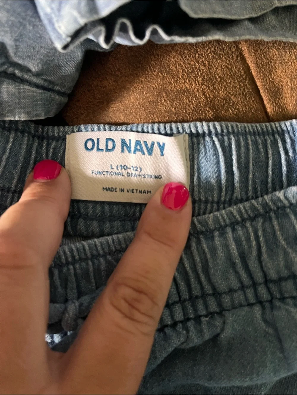 Two pair of girls Old Navy drawstring denim shorts. Both size 10/12.